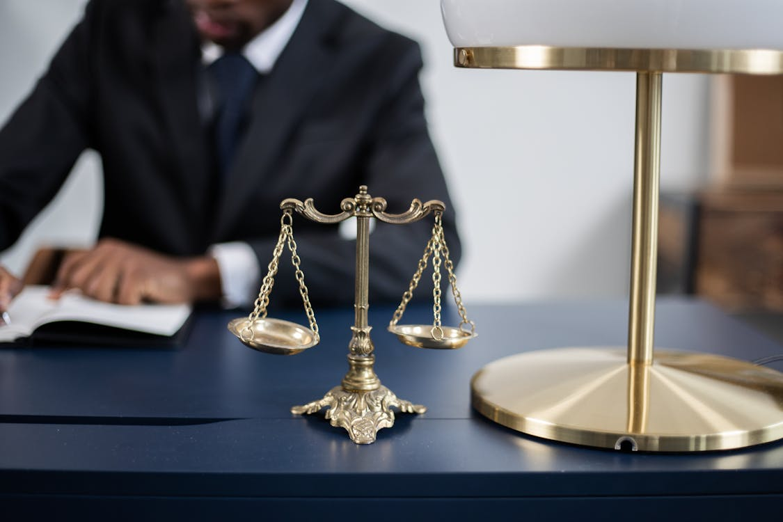 A balance scale at a lawyer’s desk
